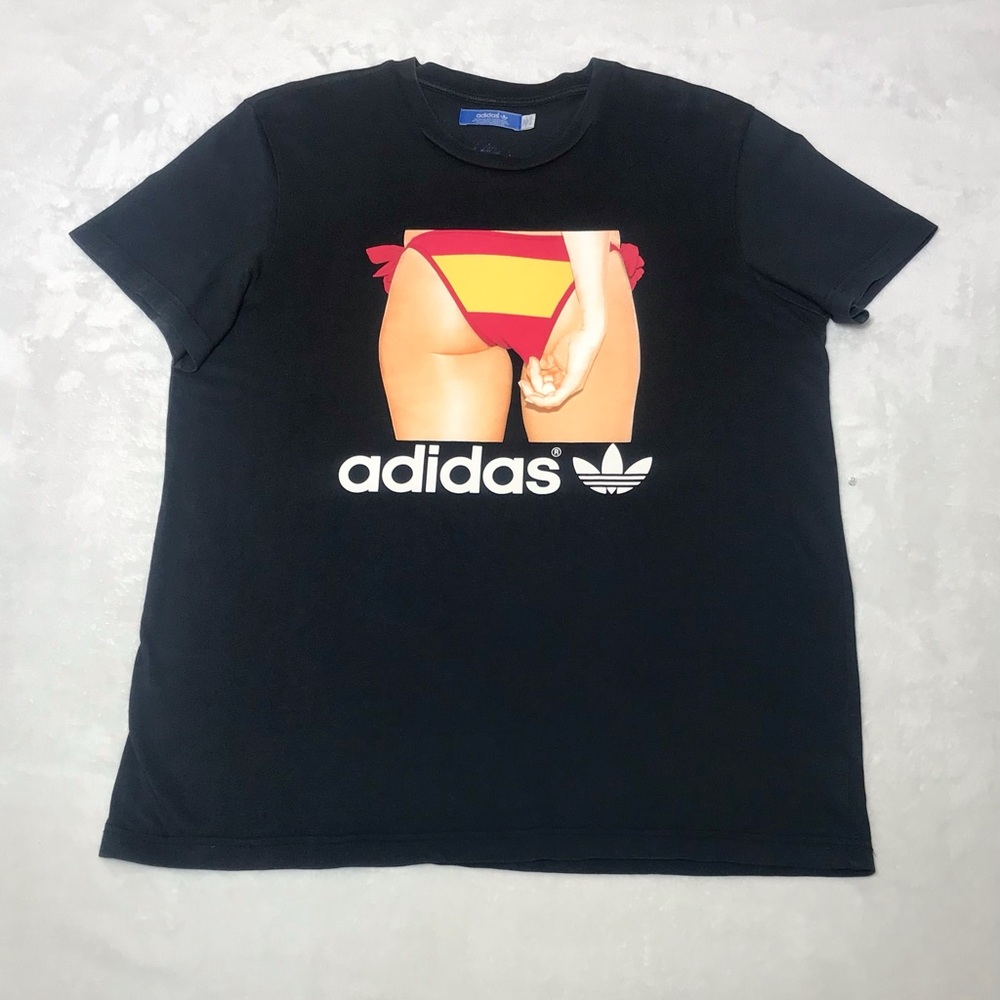 Adidas Rare Men's Black Graphic Tee with Red/Yellow Accent